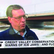 CVC's director of watershed knowledge addressing mediea about ice jams on the Credit River.