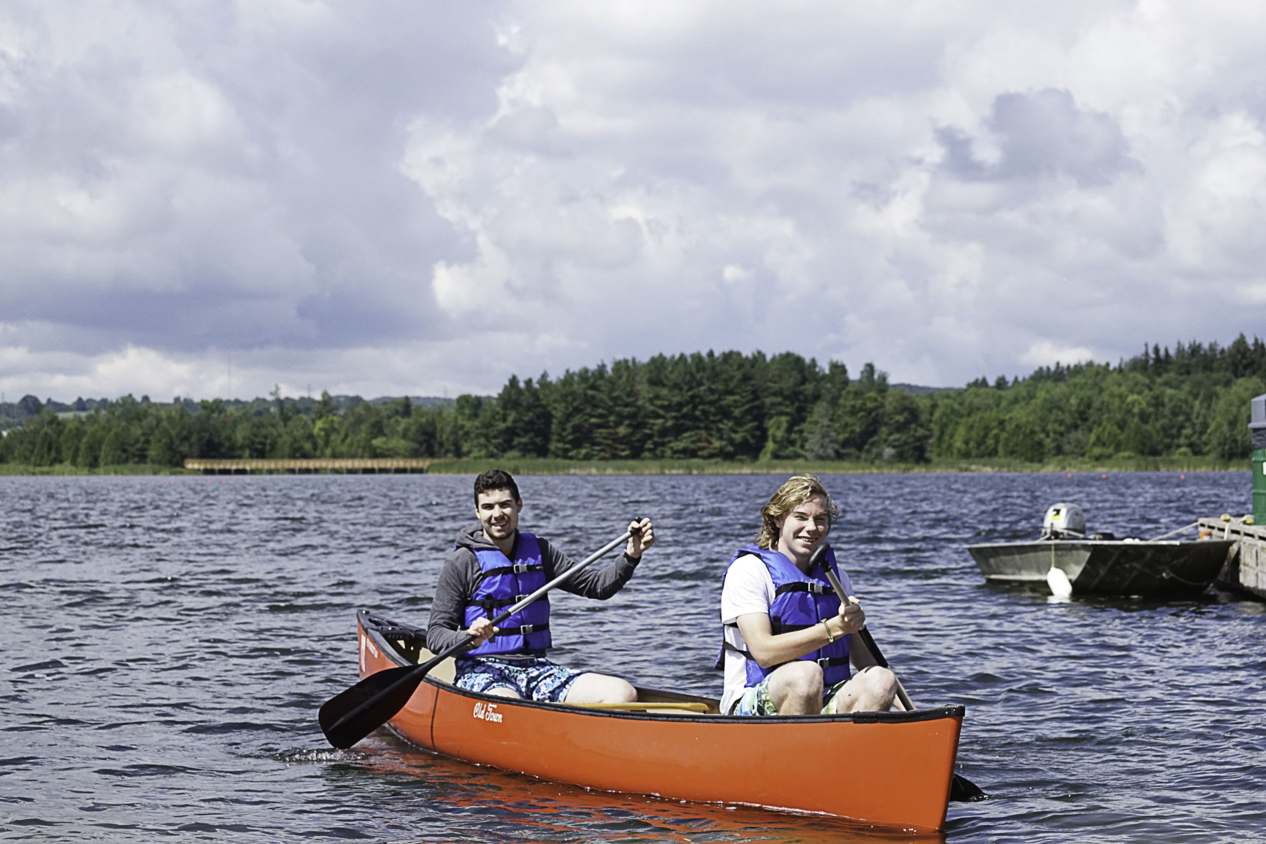 Two people canoeing on Island Lake